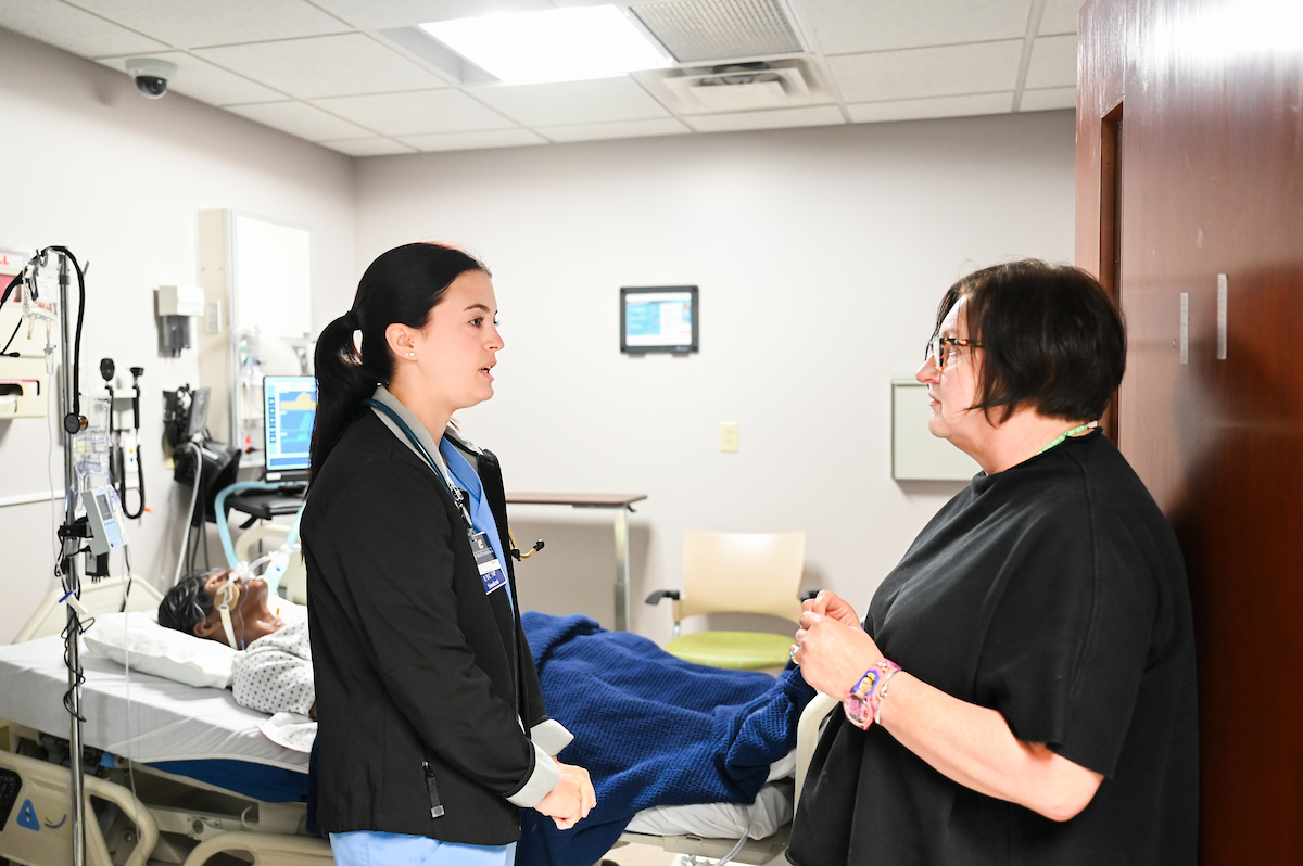Alexis Murray discusses the AI simulation with Nursing Simulation Coordinator Michelle Rosano.