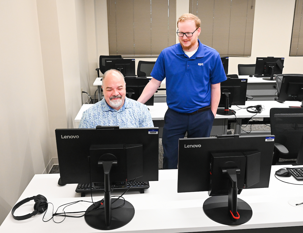 UTC BAS-IT CyS student Paul Allen, left, and Tucker Green, an information security manager at EPB and Allen’s internship supervisor. Photo by Angela Foster. 