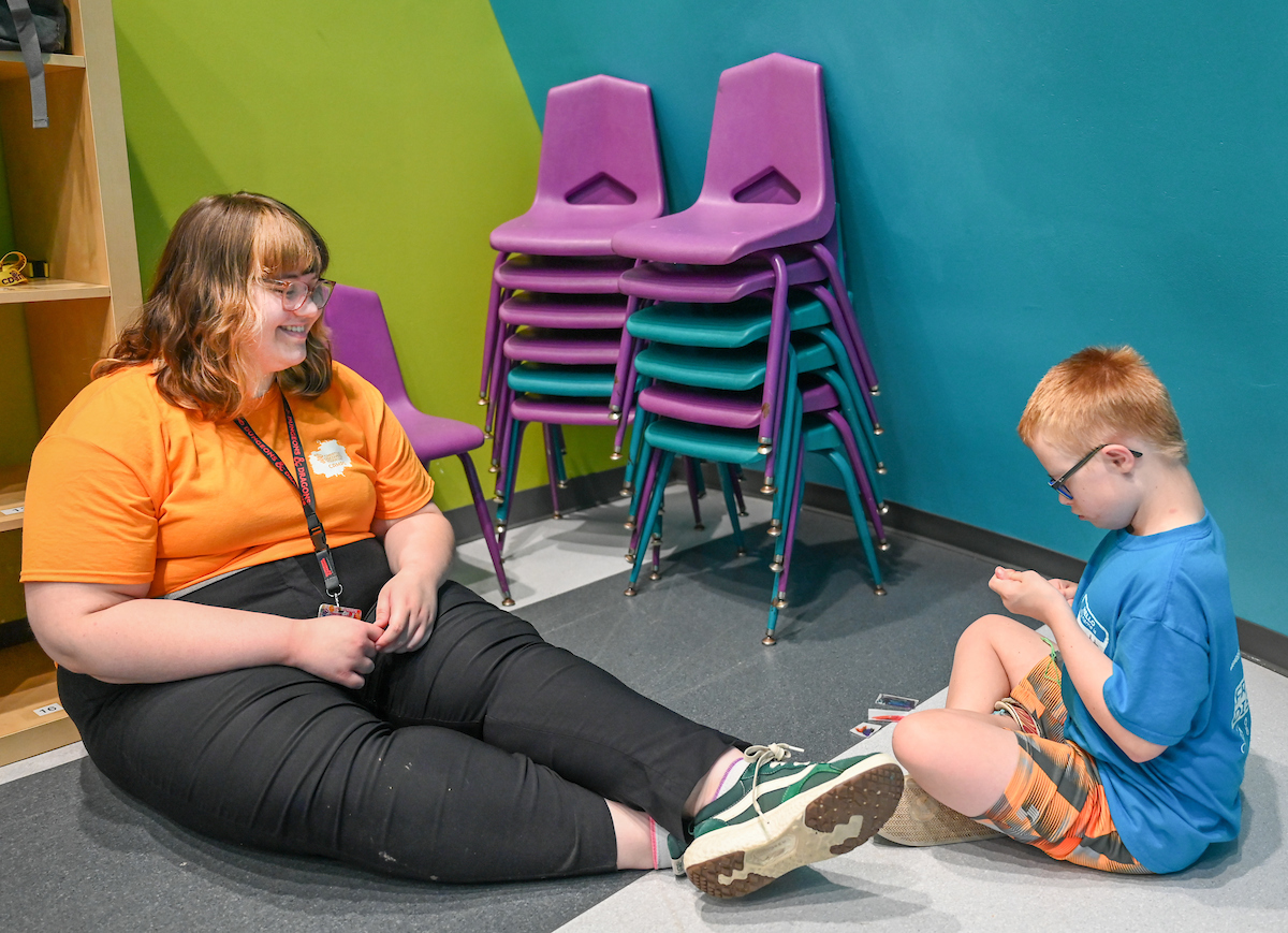 Psychology students work with Friends Discovery Camp campers Thursday, June 12, 2025 at the Creative Discovery Museum.