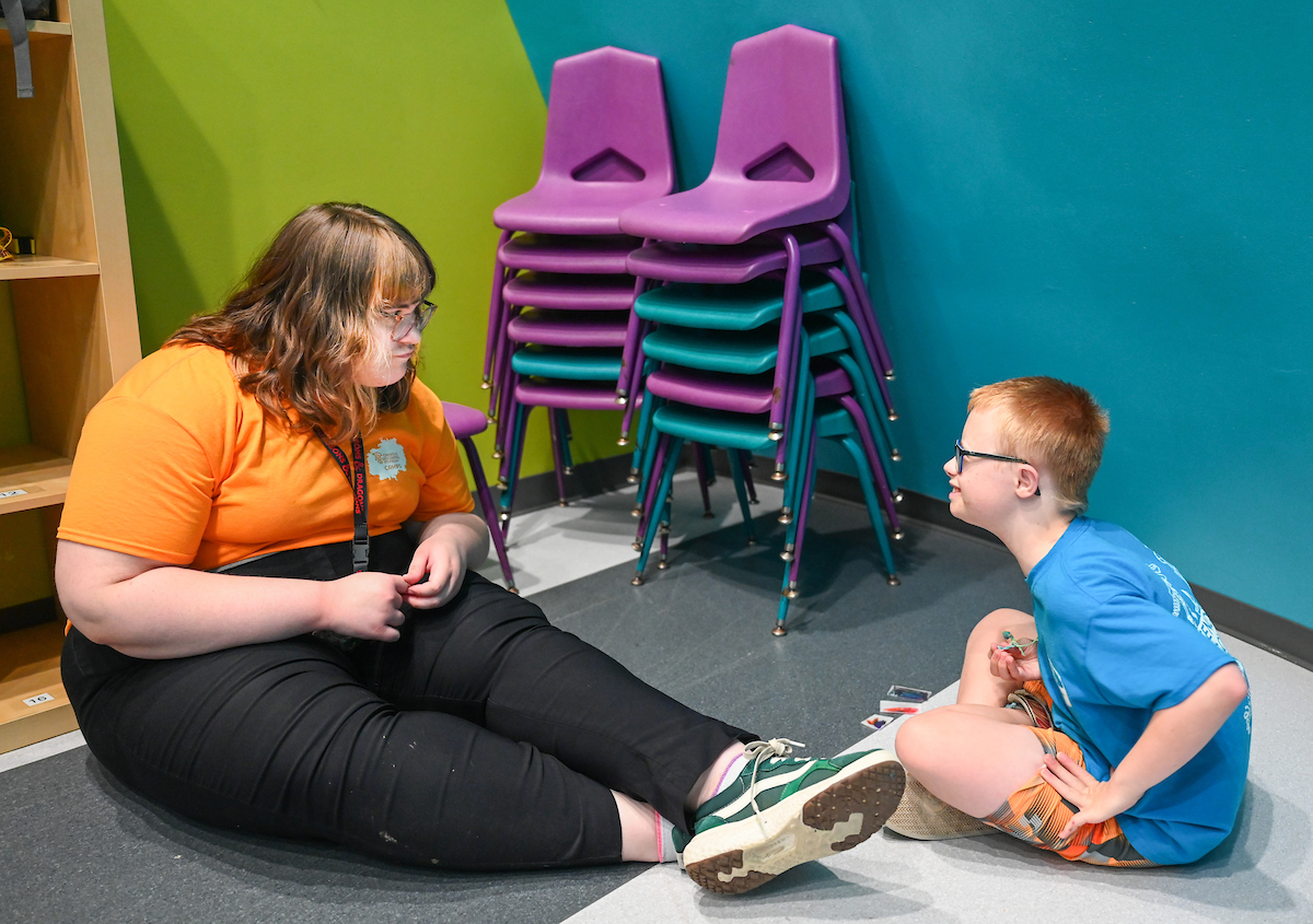 Psychology students work with Friends Discovery Camp campers Thursday, June 12, 2025 at the Creative Discovery Museum.