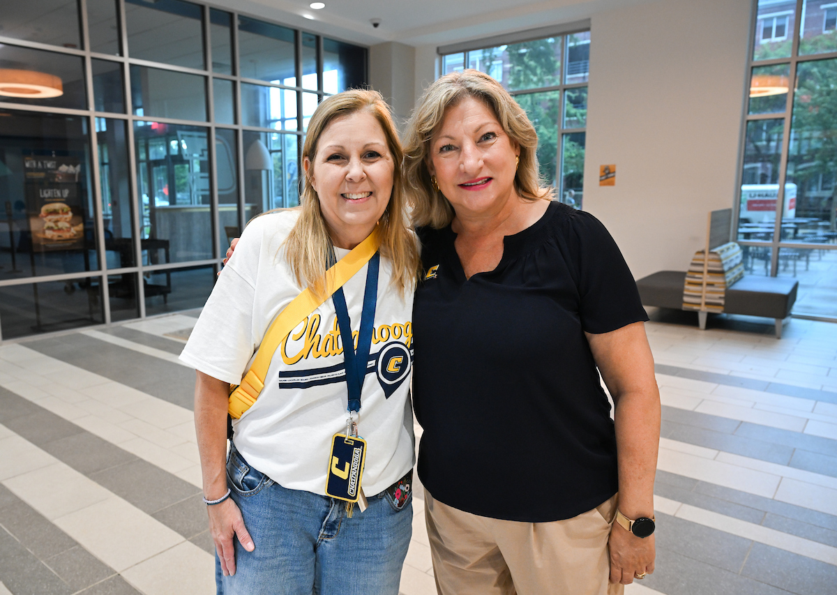 Chancellor Lori Bruce stands in West Campus Housing with Christy Waldrep.