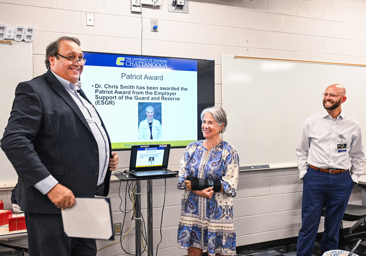 From left: Retired Army Lt. Col. Scott Hardin, Dr. Chris Smith and Terry Ellis at the Patriot Award presentation.