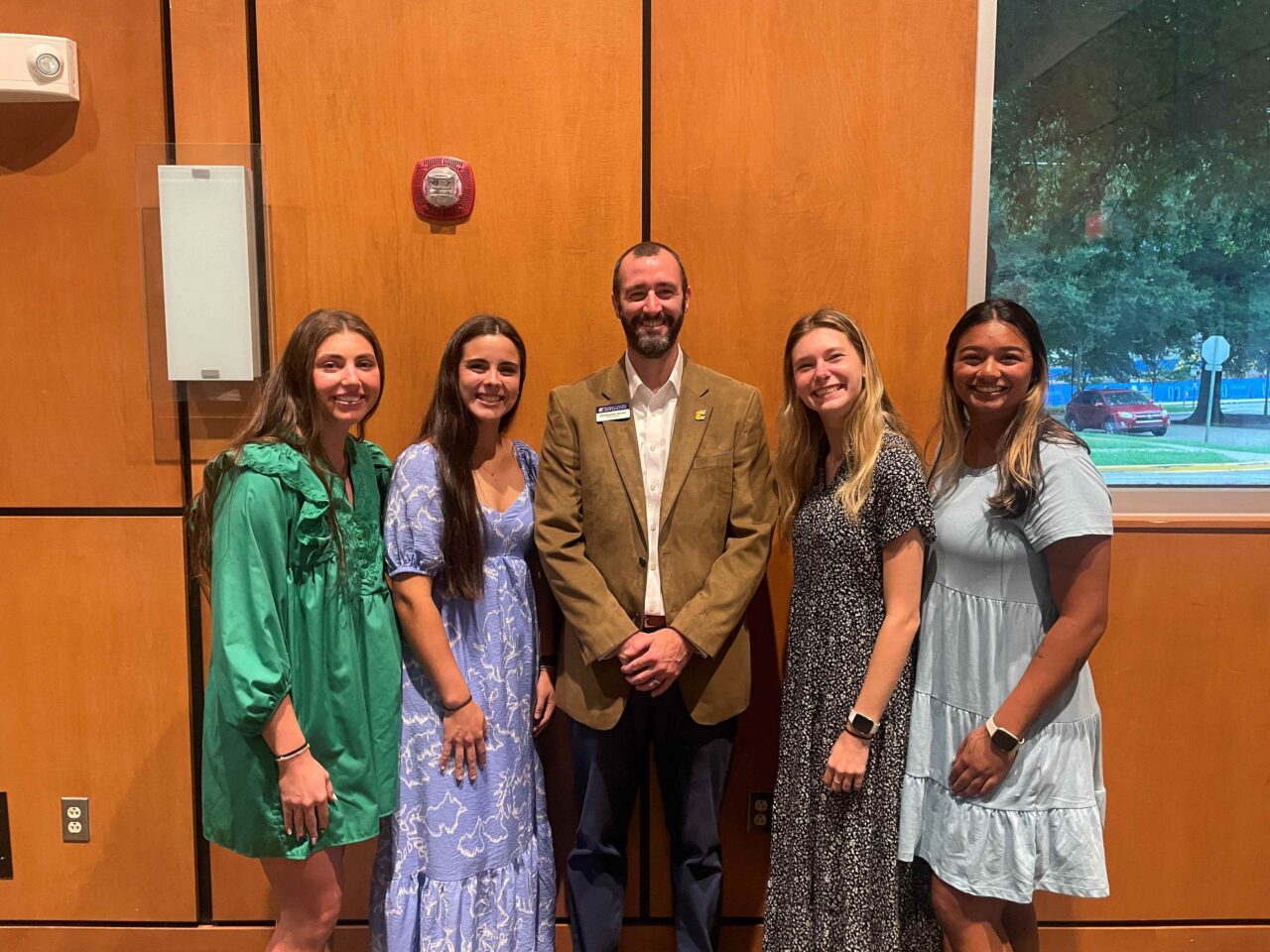 School of Education Clinical Experience Coordinator Chris Brown, center, with former students and first-year teachers Claire Brusky (Battle Academy), Carly Akins (Battle Academy), Liz Hertweck (Dupont Elementary) and Reagan Mangavalli (Clifton Hills Elementary). Photo courtesy of Chris Brown.