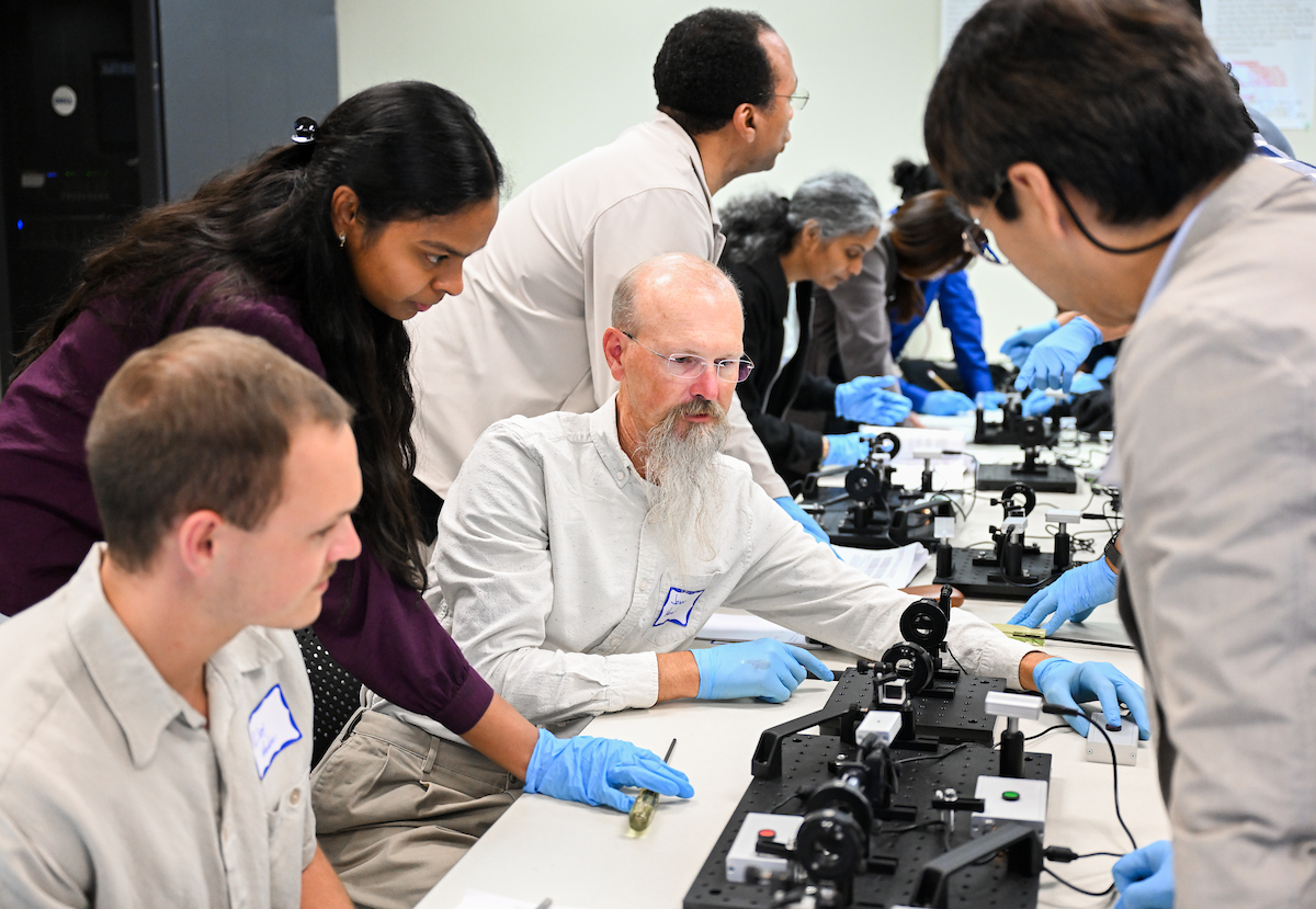 Faculty researchers from across the country, including Ivy Tech Adjunct Professor Jason Henslee (white beard), participated in the three-day workshop.