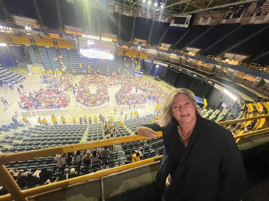 Chancellor Lori Bruce poses with the Class of 2029.