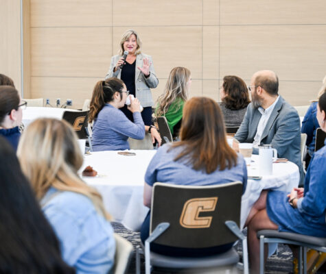 Chancellor Lori Bruce (in gray sport coat) talks to attendees Wednesday, Sept. 17, 2025 at Coffee with the Chancellor in Wolford Athletic Center.