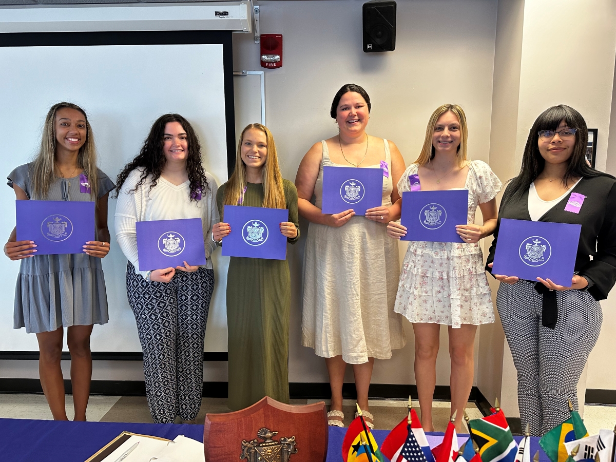 May 2024 UTC School of Nursing Zeta Alpha Chapter induction ceremony with students holding their induction certificates