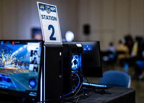 A computer at Station 2 showing a Rocket League video scene