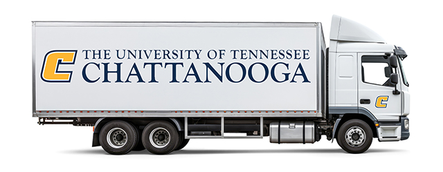 white moving truck with UTC logo on the trailer and the power c on the cab.